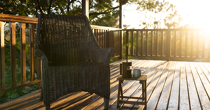 wood deck with chair and side table