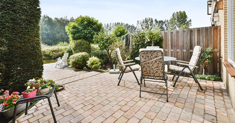 brick patio with table and chairs